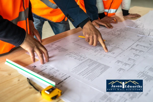 See if you need a party wall agreement for building along boundary line Hammersmith and Fulham